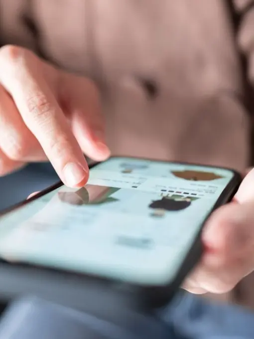 Person browsing on a smartphone screen